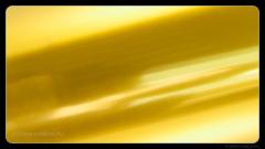 Глянцевая желтая пленка на фары